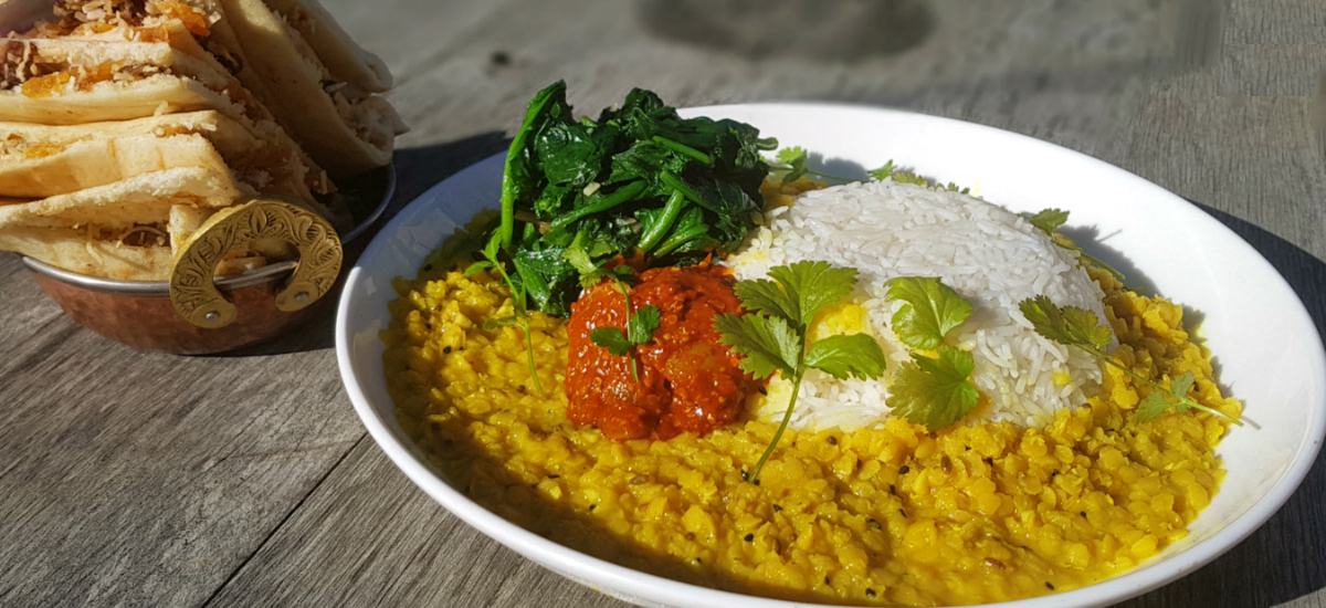 Yellow dahl and basmati rice with garlic spinach and stuffed paratha