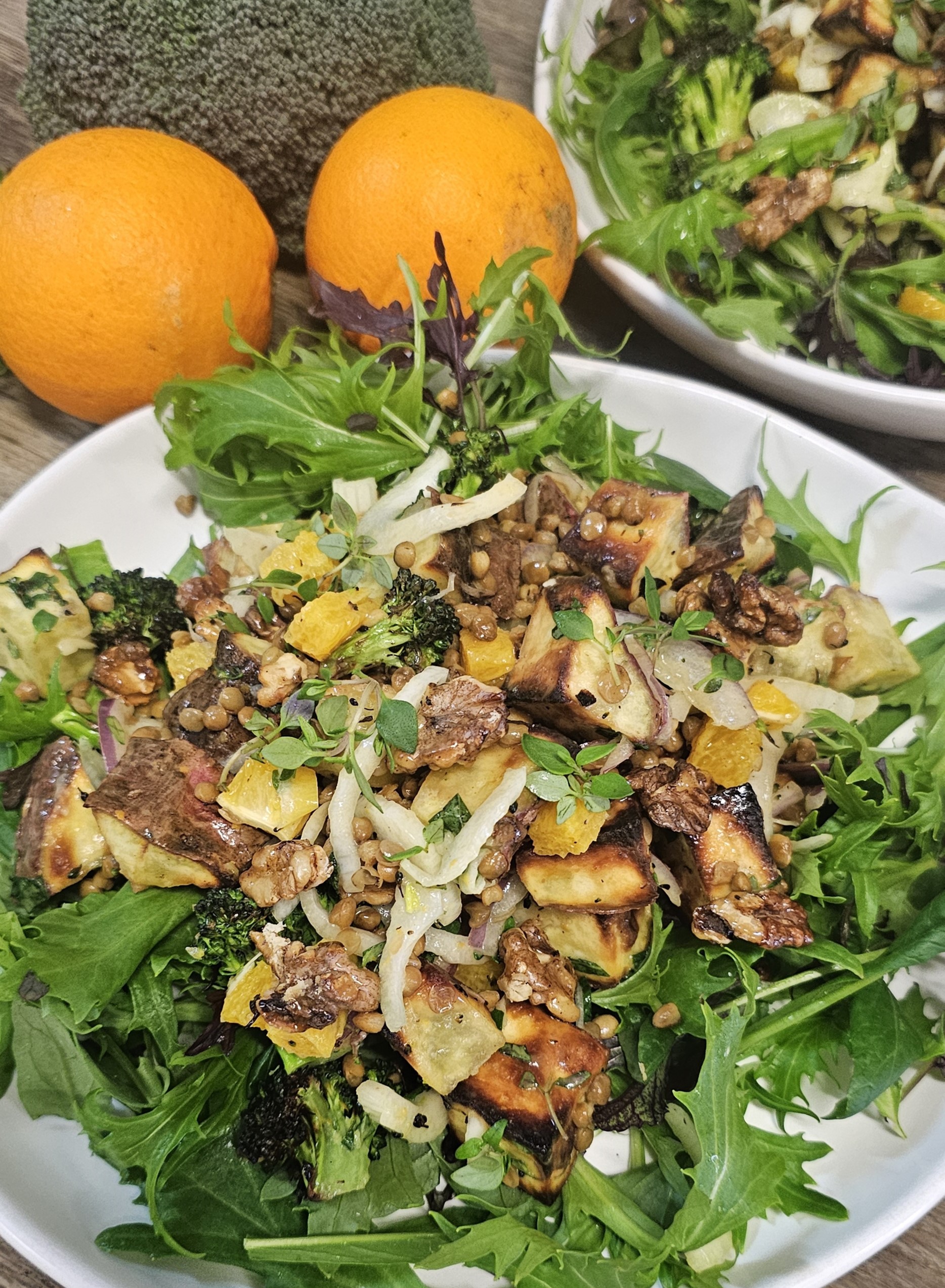 Roast kumara, broccoli, fennel, lentils and candied walnuts with orange & thyme dressing